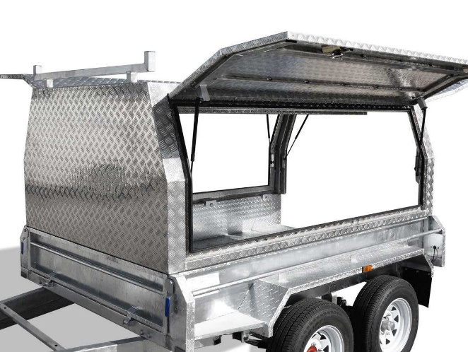 Tandem builders trailer with enclosed alloy canopy and twin racks